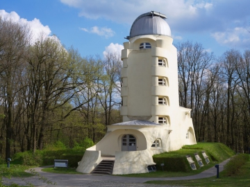 View of the modern white building of the Einstein Tower, a solar observatory belonging to the AIP in Potsdam.